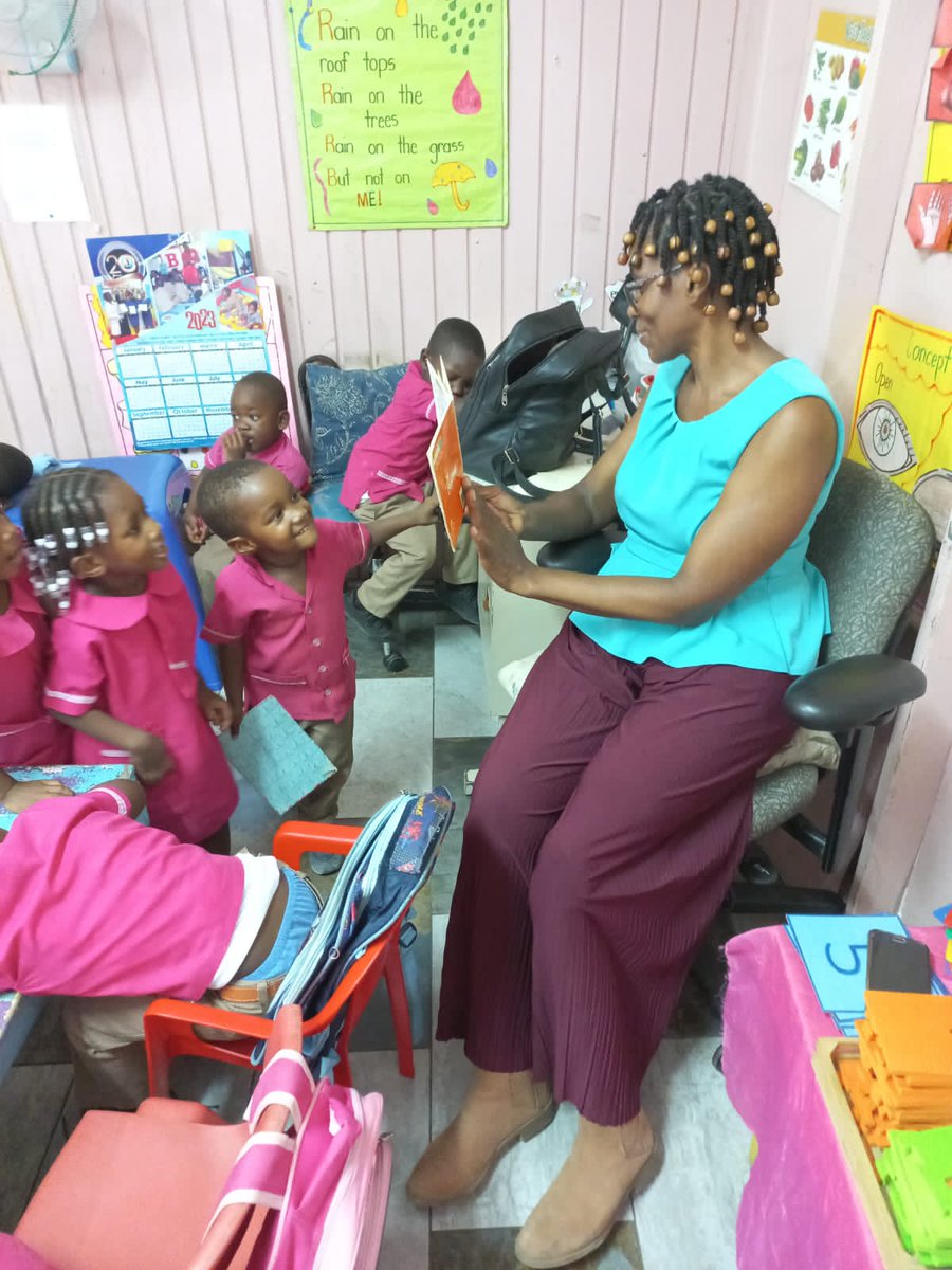 golebourne's tweet photo. Ms Gayle from Seaforth branch Library in St Thomas is reading to children at the Ágape Basic School. #12StandardsMatter #ReadingMatter @MOEYJamaica @ECCJA @tkmsingh @TanishaMill2012 @karlenedesland1 @ItzmellEcc3 @KemmyLeslie @Kevin62642151 @cfranoBrighty @GrantShaunette @JISNews https://t.co/3GVA2S7gLS