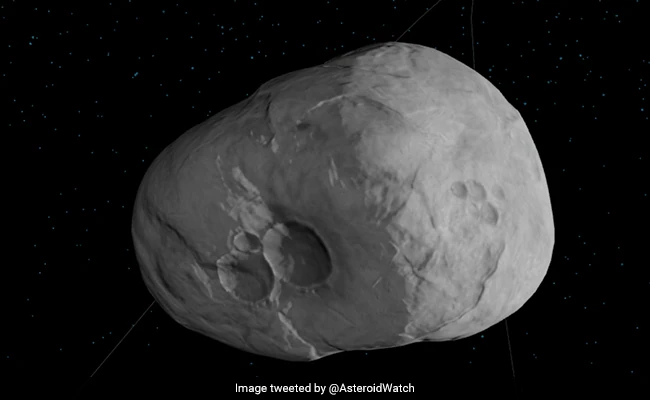 ndtv's tweet photo. Huge 91-Metre-Wide Asteroid Heading Towards Earth, Warns NASA https://t.co/Vqu6B885mi https://t.co/fEStivQsN3