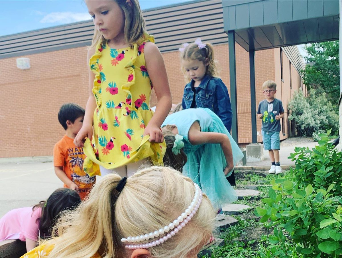 Planting our home grown, flower tower marigolds!  Happy summertime BCS!! #teambeiseker #rvsed