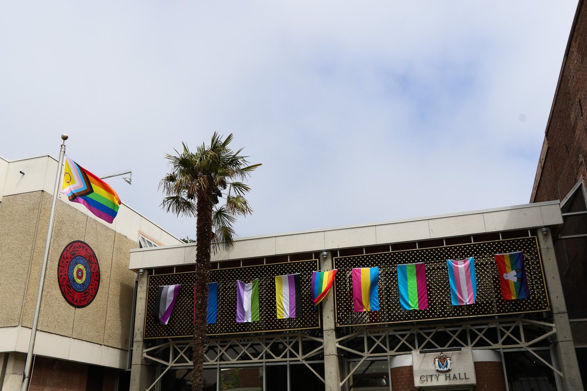 Mayor Alto, members of Council and <a href="/VictoriaPride/">Victoria Pride Society</a> raised the Progress Pride Flag outside of City Hall today. In honour of 2023 PRIDE Week, we’re flying nine flags adjacent to #yyj City Hall on Pandora Ave. #yyjpride