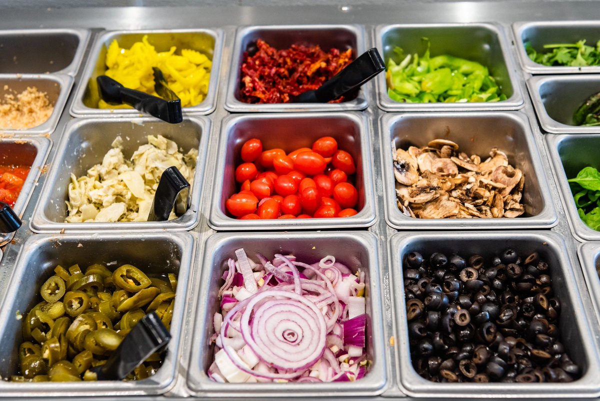Looking for a tasty side to go with your pizza? Try our all-you-can-eat salad bar! With endless options you're sure to find something fresh and savory to love. 🥗 #LakeTahoePizzaCo