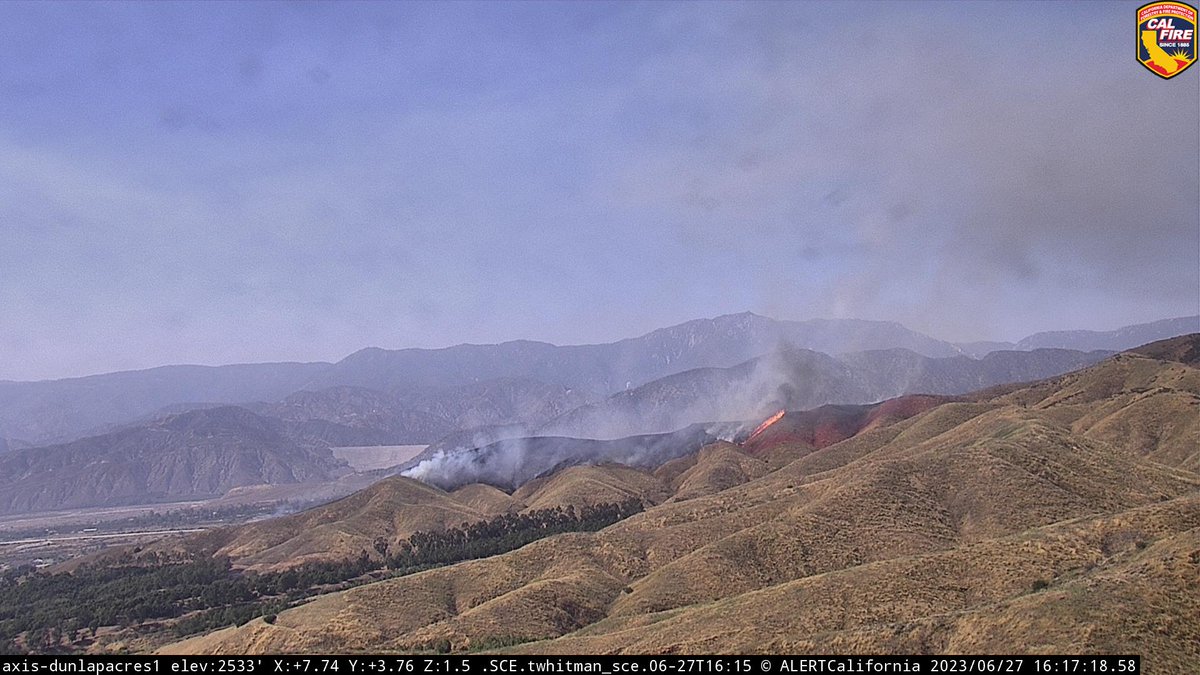 ALERTCalifornia's tweet photo. @CAL_FIRE is using the Dunlap Acres 1 camera to monitor the #NiceFire near Redlands. Lots of air activity. Follow @CALFIREBDU for updates and view live at: https://t.co/BKSnBem6bx #ALERTCalifornia ##calfirebdu #CALFIRE https://t.co/yUBPqnXu7o