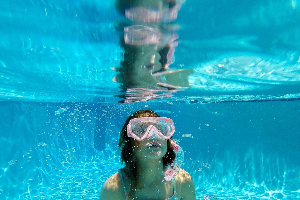 JFoch's tweet photo. When dad is a photographer and you get new pool toys for your birthday. 🤿 https://t.co/TEKQlqA9zO