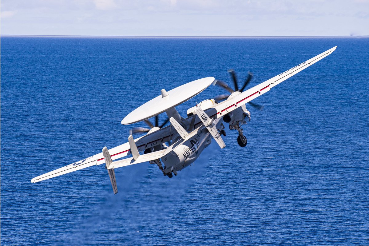 A Navy E-2C Hawkeye launches from the USS Nimitz, not pictured, during routine operations in the Pacific Ocean, June 26, 2023.
