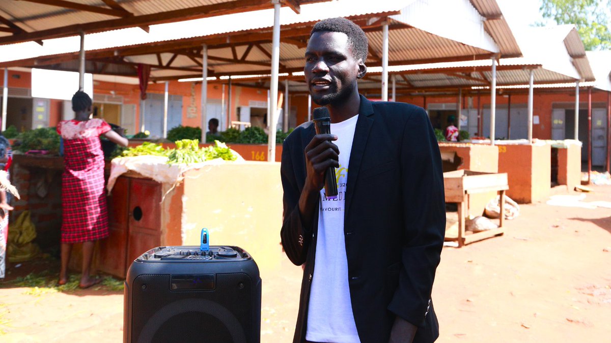 Backup_Uganda's tweet photo. Ever since we started playing the  #EveryChildCanLearn podcast at Olailong market in May, Moses is enjoying the experience with parents:

“Their curiosity turned into genuine interest, and they started approaching me for more information.”  

#TraineeJournal #FrostigTrainee https://t.co/C51mCqPZw5