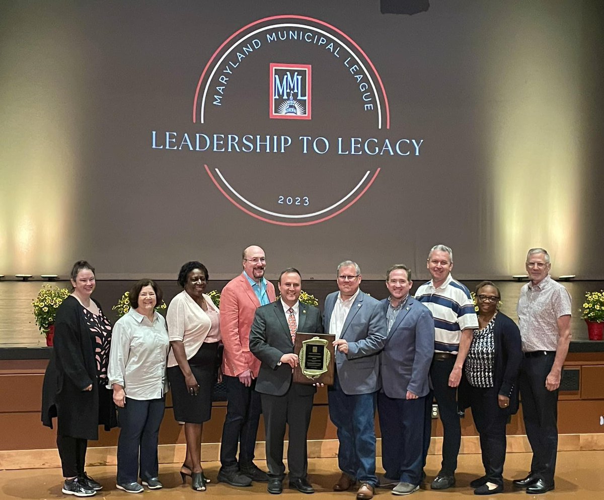 jimmcnulty's tweet photo. That’s a wrap on #MMLCON23! Congratulations to my friend and colleague @RySpiegel on receiving a lifetime achievement award. A fitting way for him to wrap up 16 years of municipal service. @iamwesmoore gave the keynote, celebrating the partnership with MD’s municipalities. https://t.co/yiohUq3zUr