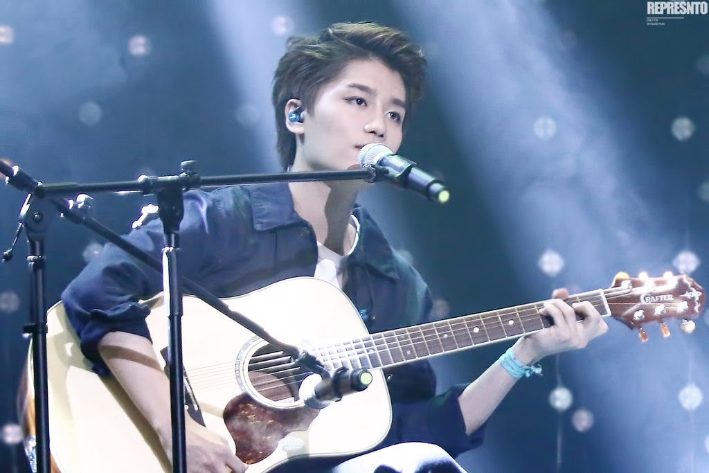 midamsbae's tweet photo. @nct_menfess Taeil hair up + main gitar 🥰🥰🥰 https://t.co/Qj7EmrstgX