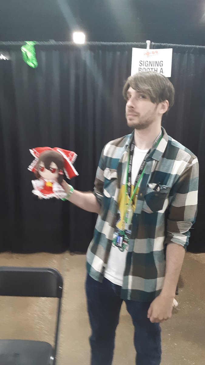Got Vinny to hold my Reimu fumo over at TooManyGames. He looks less than amused lol.