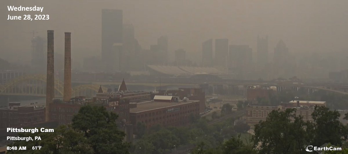 NWSPittsburgh's tweet photo. What a difference a day makes! Here's a view of downtown Pittsburgh from this time yesterday vs. this morning. 

🚨 An Air Quality Alert remains in effect for western PA through midnight tonight. #pawx

📷Webcam: https://t.co/GcRoLWXREe https://t.co/nPFLNfv9gM