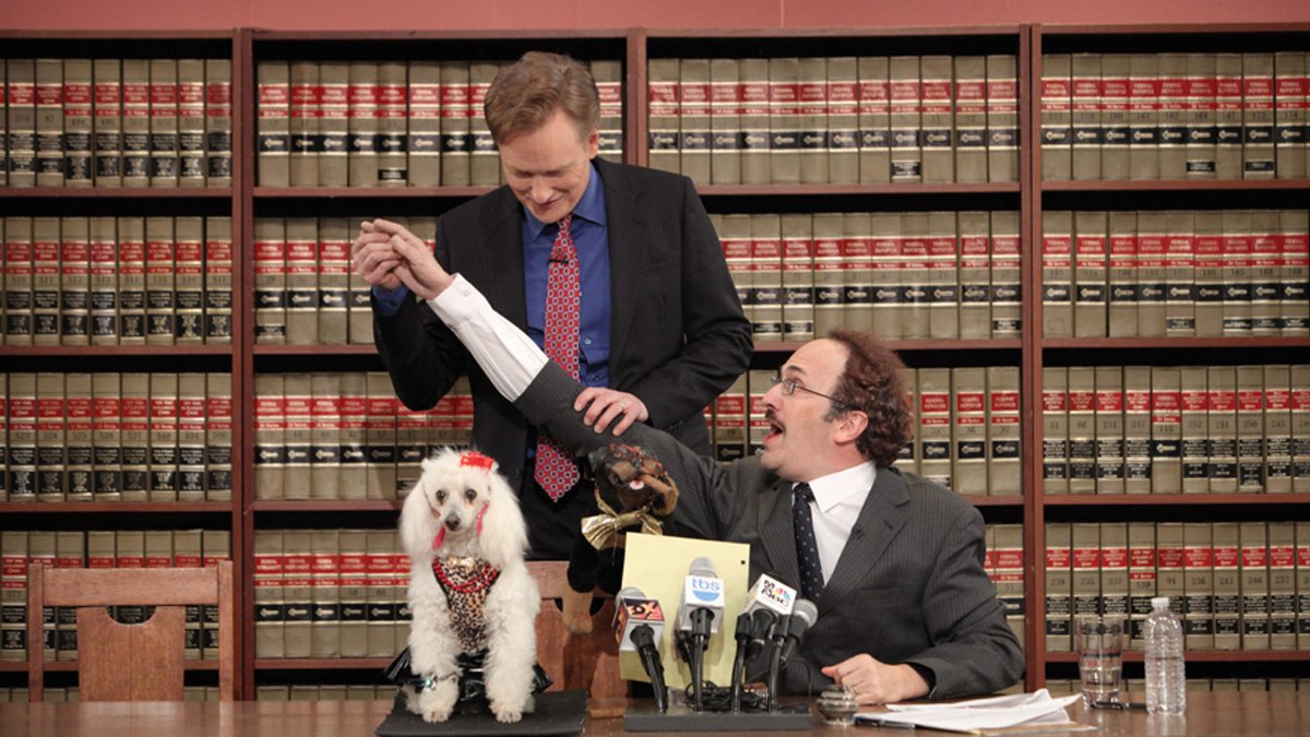 TeamCoco's tweet photo. On #INSIDECONAN Robert Smigel (@TriumphICDHQ ) Jonathan Groff (@NotThatGroff ) and Matt O'Brien join Mike and @jessiestwats as the head writers from each era of Conan's shows to discuss their favorite moments from each of their Late Night reigns. Listen: https://t.co/BPOYmBzyom https://t.co/gXwPuTY3md