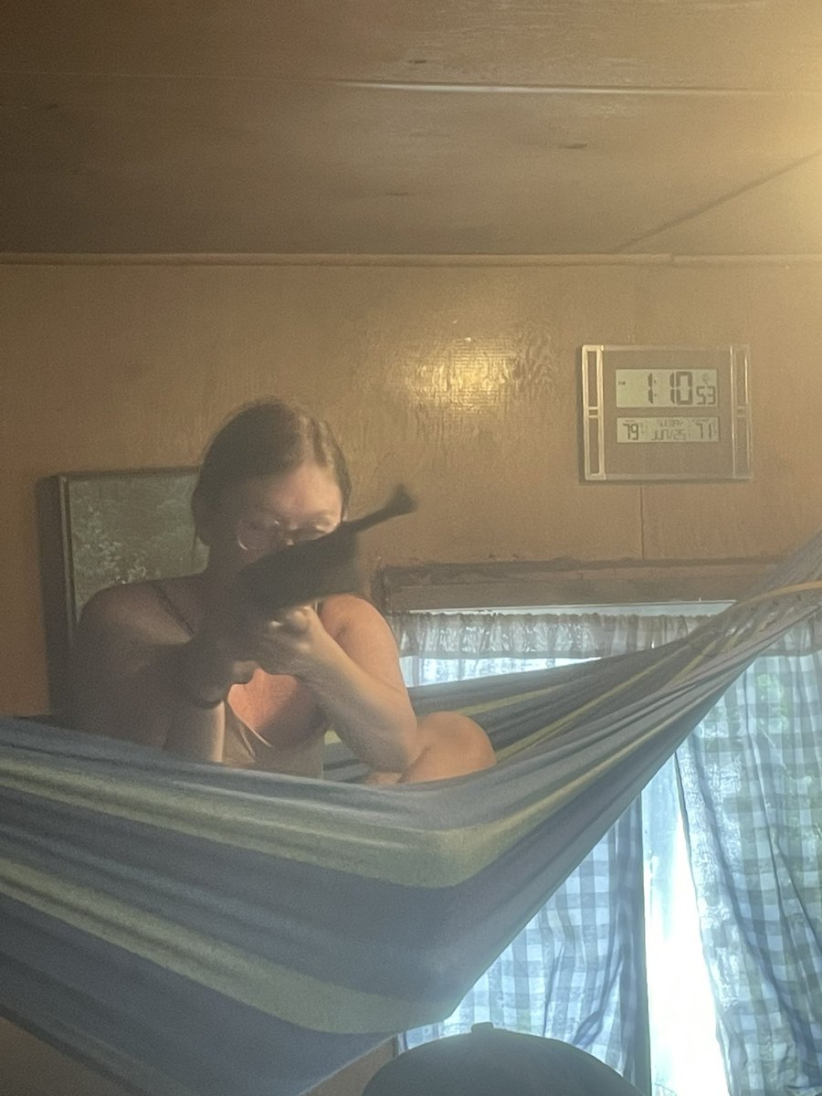 NothingPertains's tweet photo. This is why people can’t trust American hippies. There’s a gun in every hammock. https://t.co/j4os8rdXFX