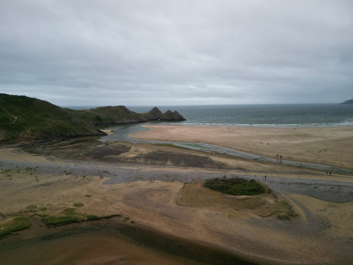 GeographyTGAW's tweet photo. Today we visited Rhossili Beach to carry out a study of the extent to which the sand dunes fit the psammosere model, and then headed to Three Cliff’s Bay. Our plans to look at sediment were scuppered by the downpour, but students were upbeat and smiling throughout! https://t.co/2cqJpoQ779