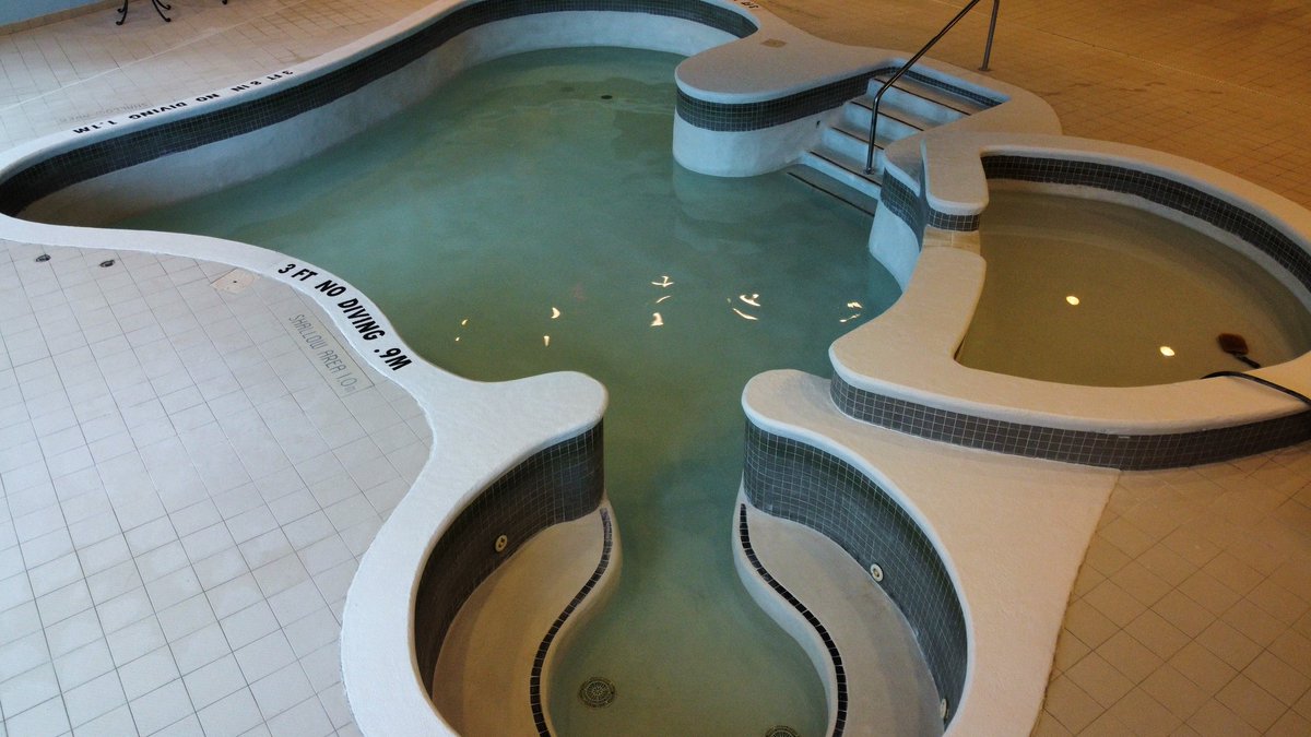 Down at the Niagara Falls Radisson hotel, we installed a full troweled on Oyster Quartz Diamond Brite aggregate finish by SGM. SGM products do not let down, and the beauty of this pool will be impressing guests for years to come. That's the San Jose Pools touch!