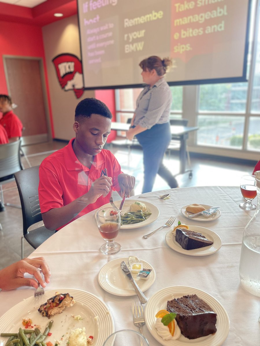 RedtpWku's tweet photo. And to close the first part of the WKU Young Male Leadership Academy Summer Camp yesterday, our students enjoyed a delicious dinner while learning dining etiquette. Special thanks to Mrs. Shannon Hicks for the presentation, the @wkurg and Catering team for sponsoring the dinner. https://t.co/X2KMMXG5nc