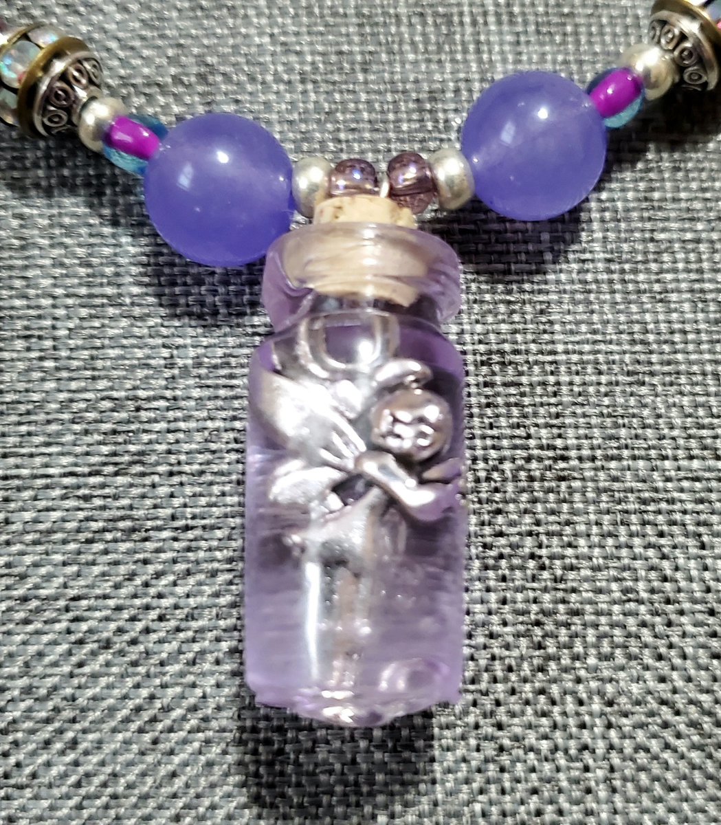 I made a Fairy in a Bottle necklace 

#fairy #fairies #faerie #fae #faeries #faelore #fairfolk #fairyinabottle #magic #fantasy #fantasyart #dnd #dungeonsanddragons #art #crafting #jewelry #jewelrymaking #jewelrycrafting #necklace #necklaces