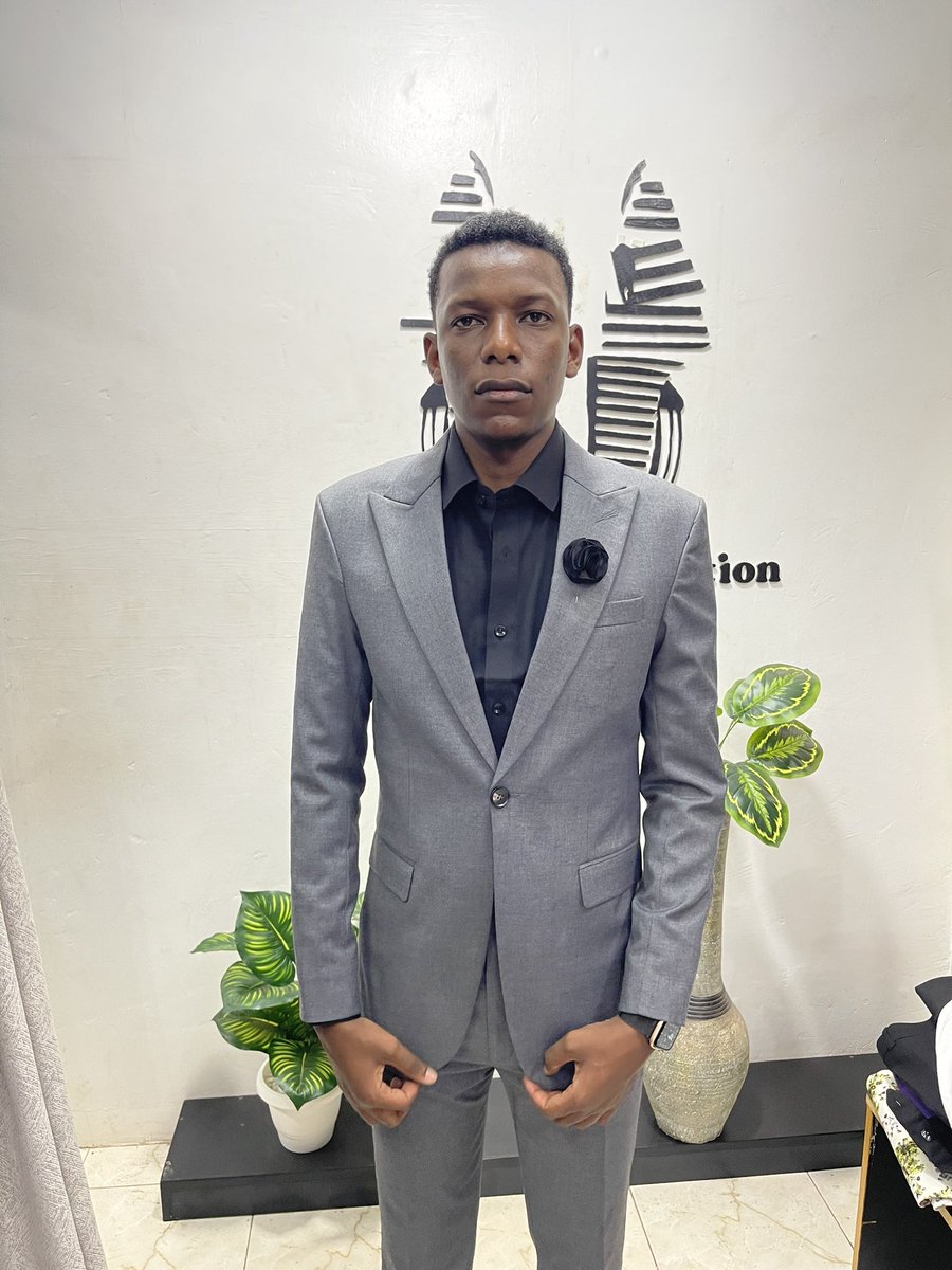 A grey suit for Mr James order your office suit from us