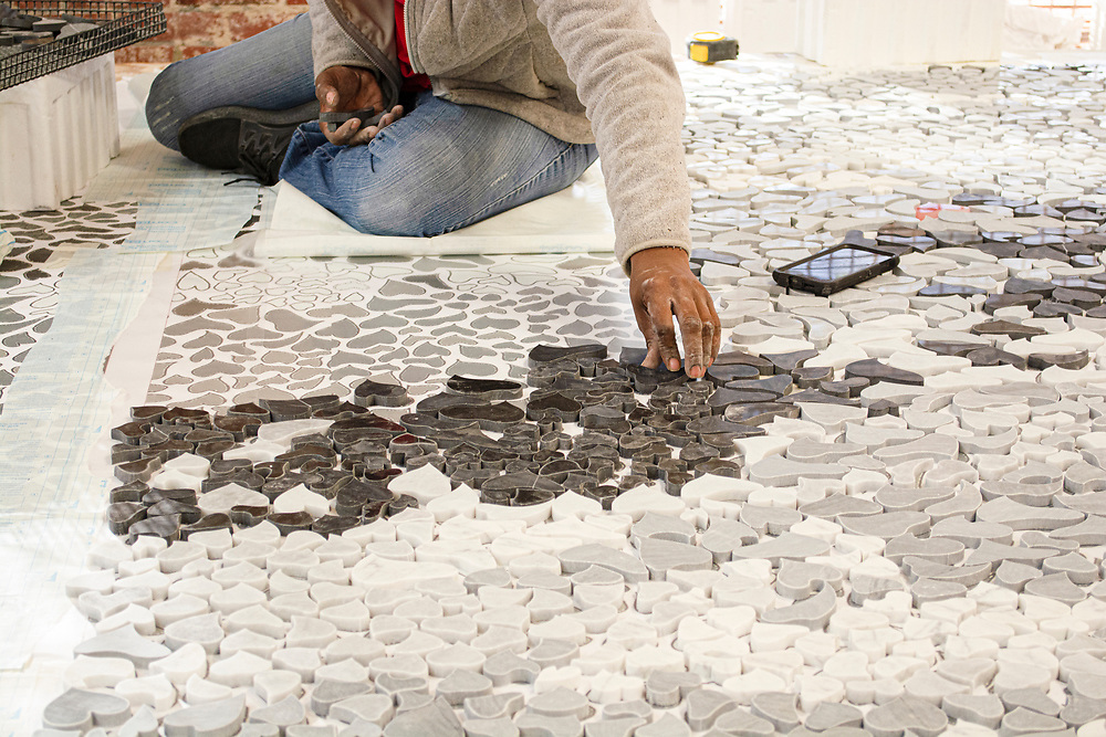 Though these intricate #mosaic pieces are cut on a waterjet machine, they are still very much #handcrafted. Each piece is carefully designed by our artists and then our CAD department; and then meticulously placed into the mosaic by hand.