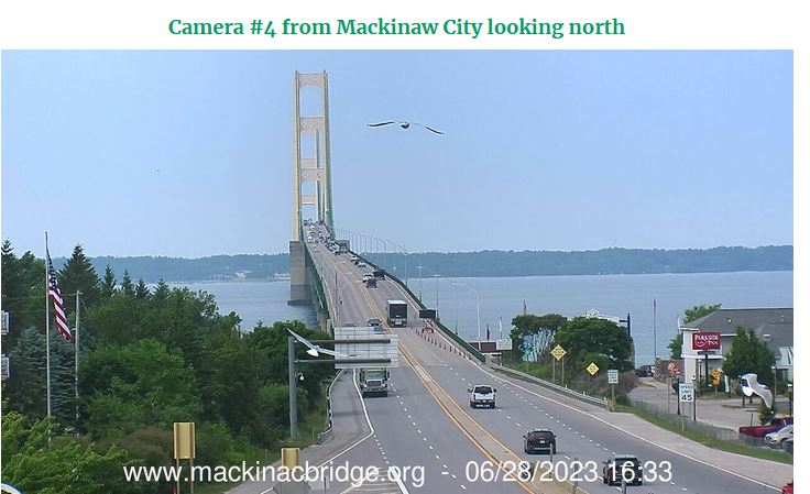 bsteffen's tweet photo. Look at the difference in these two pics. of the  #MackinacBridge - the  first is yesterday PM with of smoke - the second is today with much better visibility.   Currently, Mackinac Island has a temperature of 65 with a west wind at just 3 mph.  #miwx https://t.co/NVb6jYj1xp