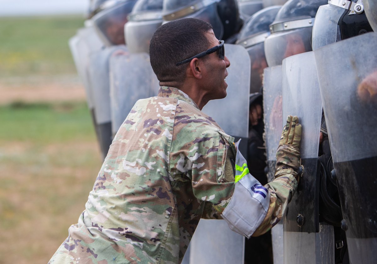U.S. Army Reserve Sgt. 1st Class Yamill Rosado, with the 607th Military Police Battalion, 200th MP Command, tests the wall of shields during the riot control portion of the Field Training Exercise at Khaan Quest 23, June 22, at the Five Hills Training Area, Mongolia.
#KhaanQuest