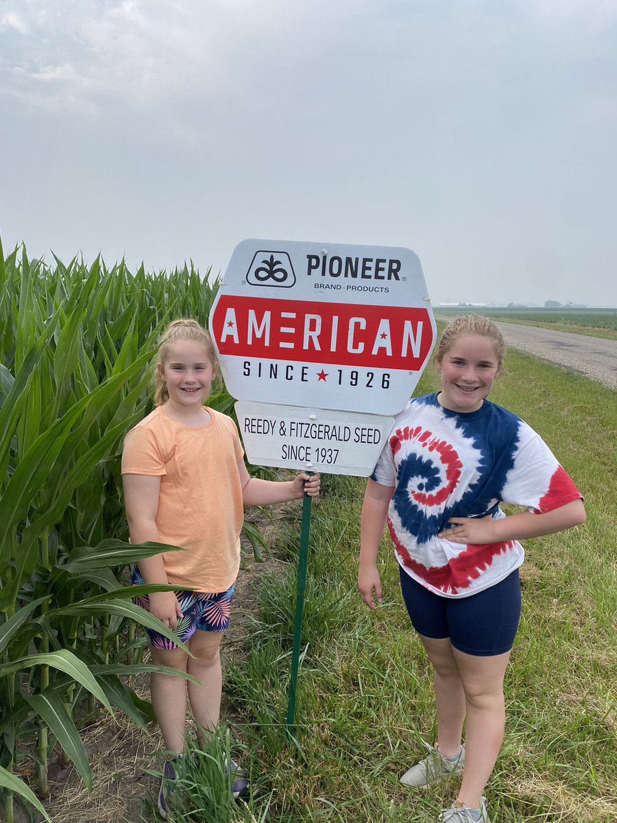 Best #pioneerseeds sign helpers around! Despite the dry weather the #corn is looking good. Hope we get the forecasted rain this weekend.