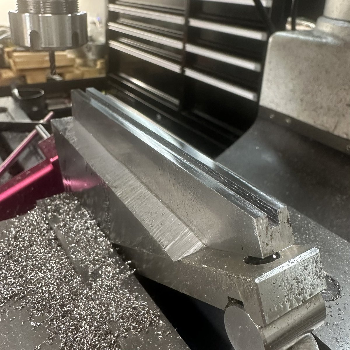 Of course I immediately snapped my only 4mm two flute end mill so it’s been slow going babying a four flute through this deep slot. Chip clearing is killing me. In hindsight, I should have started with a horizontal setup and a 2mm slitting saw then chased it with an end mill 🤷‍♂️