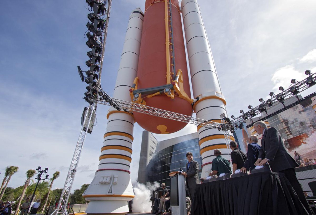 ExploreSpaceKSC's tweet photo. Happy 10-Year Anniversary to the Space Shuttle Atlantis exhibit at #KennedySpaceCenter Visitor Complex! #OTD 10 Years ago, as the countdown reached 0 for the ceremonial opening, smoke bellowed near the full-scale space shuttle stack. 🚀 #Atlantis10
📸: NASA/Jim Grossmann https://t.co/0MB92pn6EK