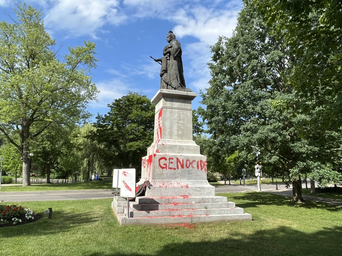 JamesScottRadio's tweet photo. The Queen Victoria statue in Victoria Park has been covered in red paint once again. It’s not clear when this incident happened. The words “Genocides”, “Famines” and “Wars” are visible on the statue. @CityNewsKIT https://t.co/AwVavgRW07