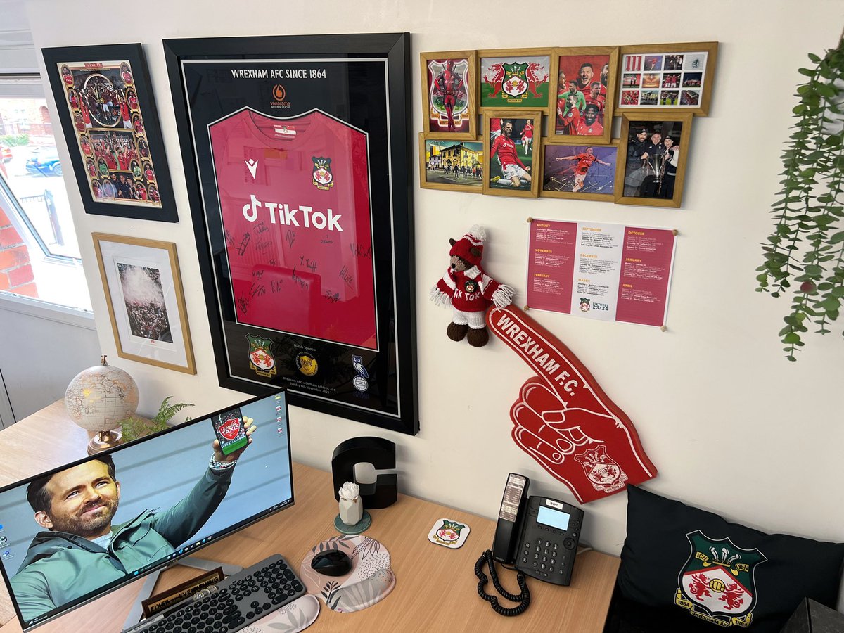 wrexhamtaxis's tweet photo. THE SHRINE 🤩⚽️ 
Anyone else’s office look like this?! 

Here’s our management room in the main office… constructed from various gifts from our lovely colleagues and of course, the upcoming fixtures list. 

#wrexham #wxmfc #wrexhamafc #wrexhamtaxis #tiktok @fearlessidzine https://t.co/cTEKPt0Ewh