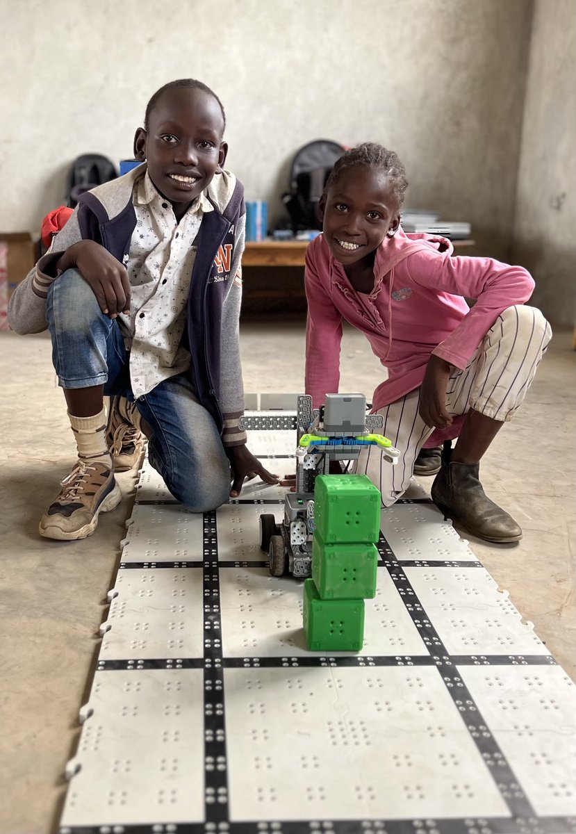 techlitafrica's tweet image. Sammy and Irene just successfully coded the robot to stack these three cubes #techlitrobotics