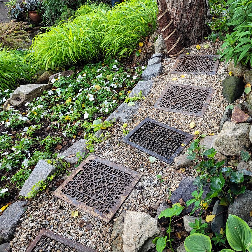 Love to see the way this gardener used old heat register covers as stepping stones! Congrats to Roslindale Green &amp; Clean for a successful garden tour last Sunday. BBR is pleased to have been a tour sponsor. <a href="/rosmainstreet/">Roslindale Village Main Street (RVMS)</a> #RosLove #creativereuse #gardeninspiration #roslindale