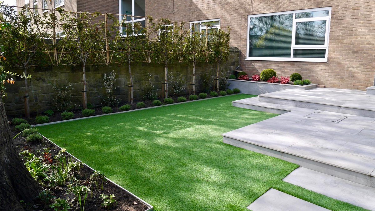 Ready for the sunshine! Creating a #contemporary, easily maintained #garden that flows out from the apartment. Perfect to relax & entertain family & friends, plus a safe space for the grandchildren to play too! @MarshallsGroup #porcelain / vitrified #gosforth #Newcastle