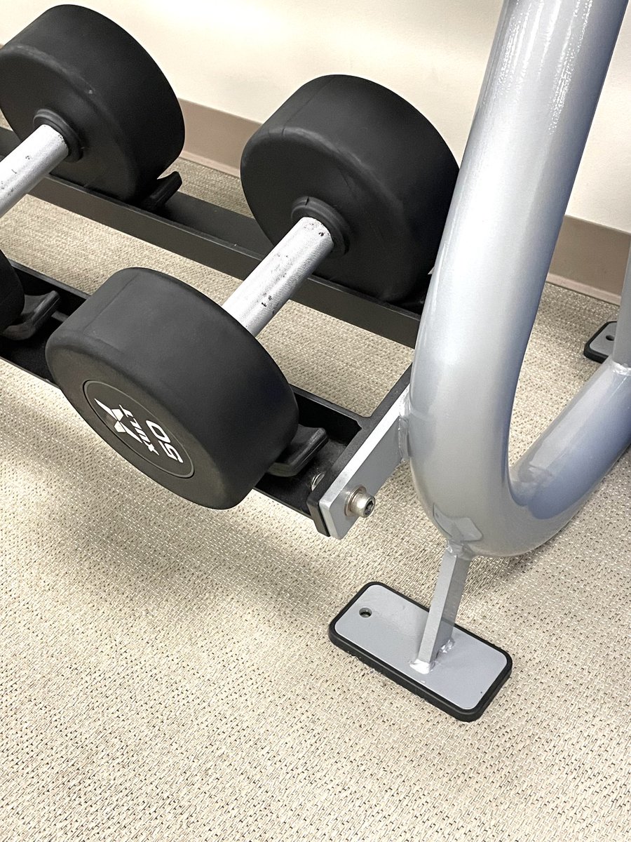 It’s clever and cruel to design this weight rack to appear to be resting on someone’s phone.