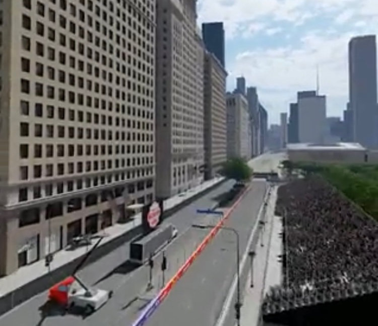 DigitalGashouse's tweet photo. This seems like a questionable spot to have a large grandstand full of spectators.  The building on the right is the Metropolitan Tower, a functional apartment complex.  

Yeah, I hope the city of Chicago learned something from the tragic Las Vegas shooting in  2017.

#NASCAR https://t.co/cCF57Hm9NU