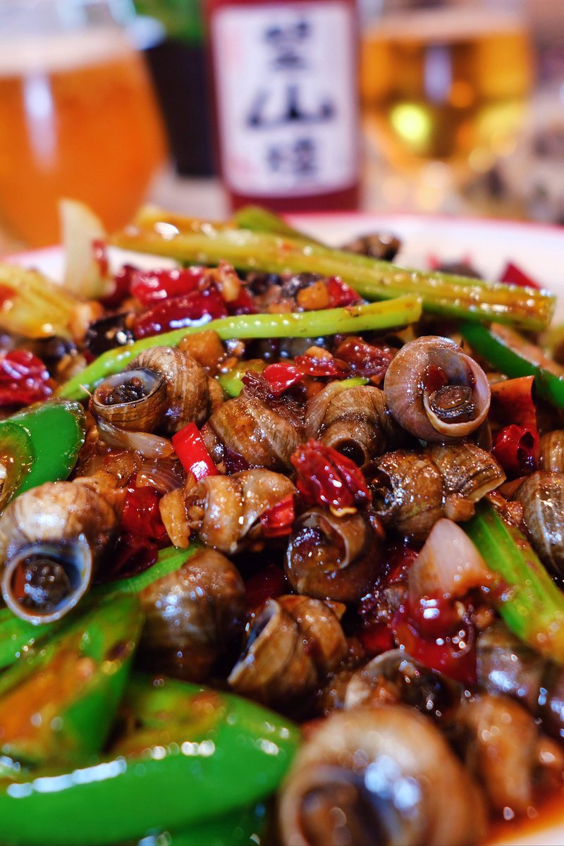 🌞🐌 Spice up Your Day with our Exquisite Spicy Fried Snail at TWX Chinese & Thai Cuisine! 🌶️🔥 #RichmondBC #FoodieParadise #FriendsAndFamily #SeafoodLovers #RichmondBCEats #FoodAdventures  #TasteOfRichmond #RichmondFood #VancouverFood #RichmondEAT #VancouverEAT #yvrfoodie