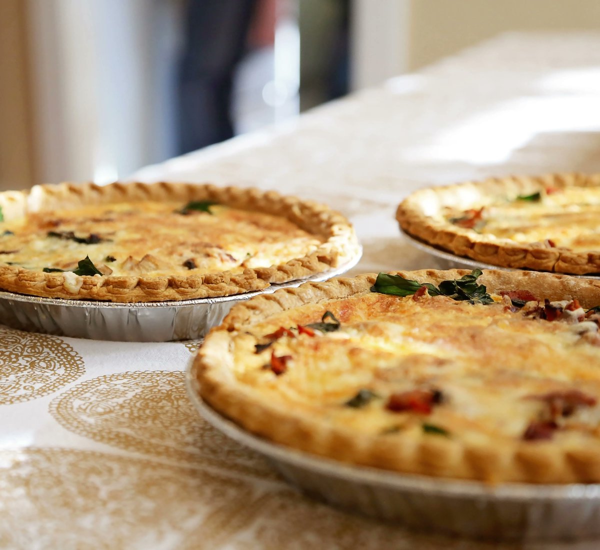 CheeseMarket's tweet photo. Come by and grab a quiche or several... we can make the long weekend easy! Let us do the work, so you can have all the fun! https://t.co/Xyh5vBowsz