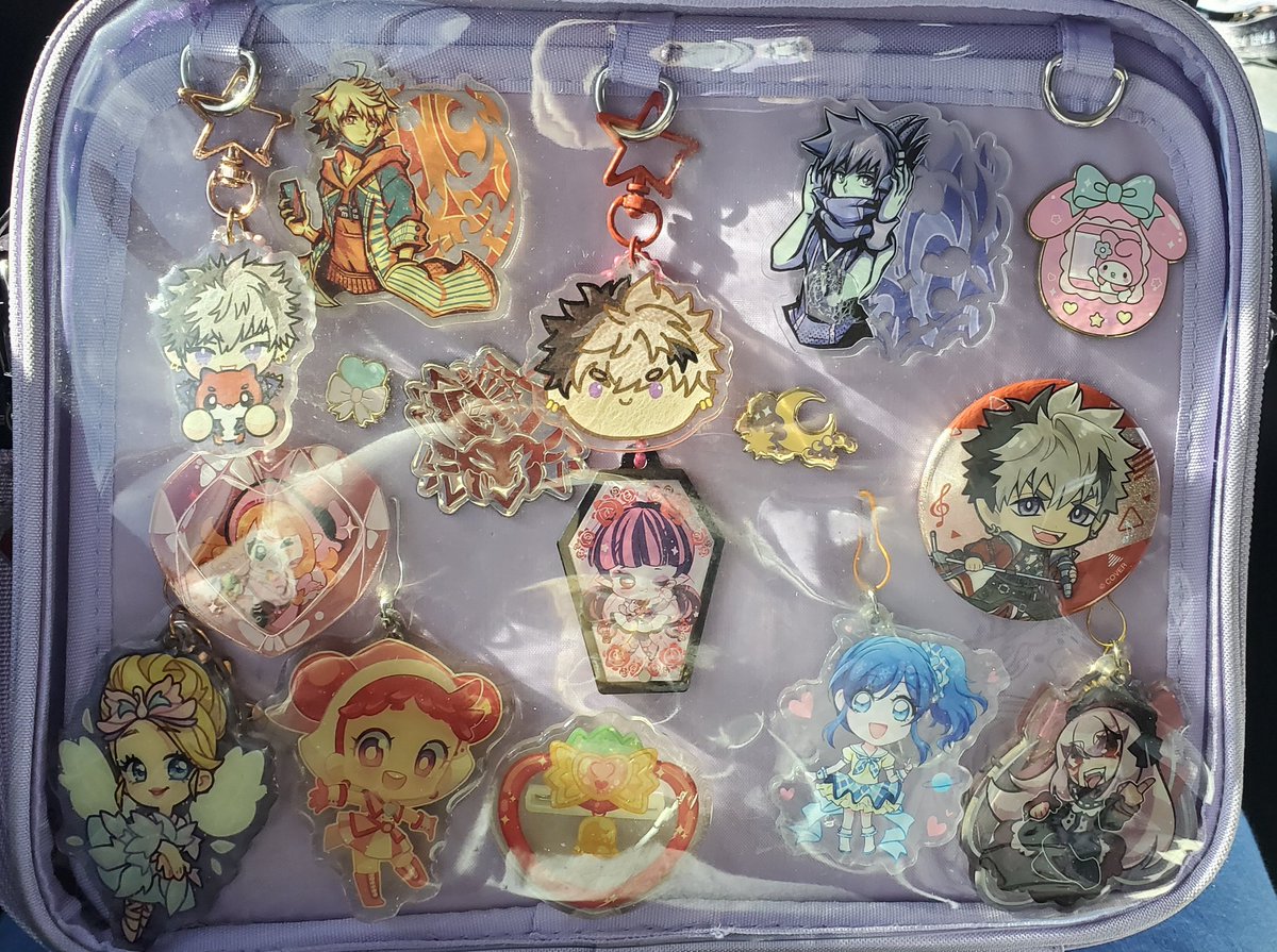 Cyleki's tweet image. the goal today is to pack this so full of new charms that it looks like a kindergarten collage craft project