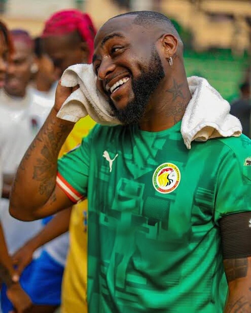 Davido rocking the Senegal national jersey in celebration of them winning the AFCON