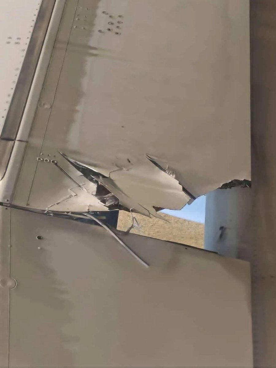 Fahadnaimb's tweet image. A350 wing shredded by tire debris... brake seizure, low quality tire, FOD, rejected takeoff , or tire burst results into this scenario✈️💥

Pics show exploded rubber ripping flaps/spoilers, damaging wings/fuselage.

Great stopping power, but collateral too common.