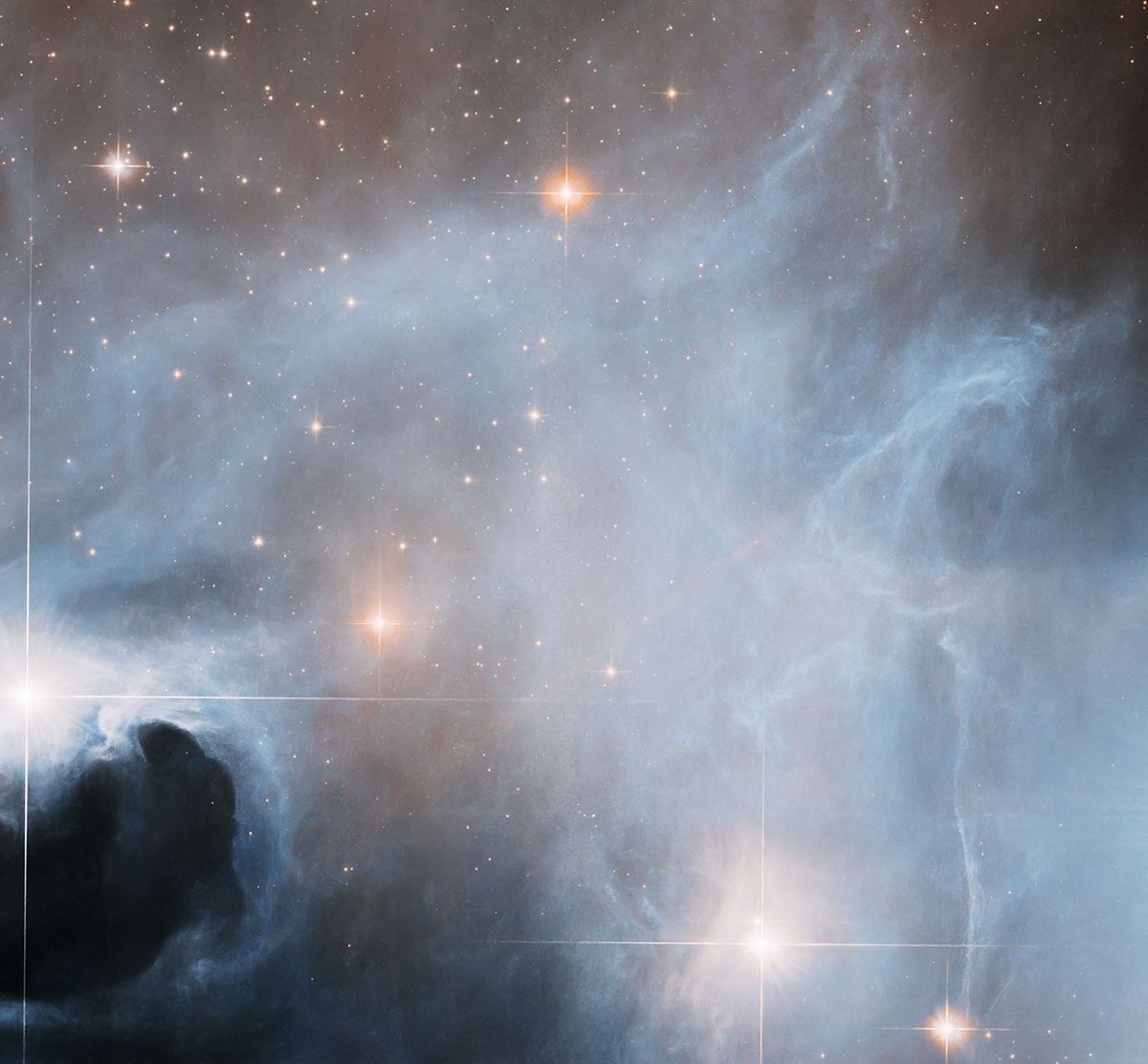 NASA's tweet image. Here’s a little ghostly glitter for the weekend 👻

You’re looking at a star-forming cloud called Lupus 3, which lives 500 light-years away in the constellation Scorpius. Learn more about this image by @NASAHubble: go.nasa.gov/3NroCTK