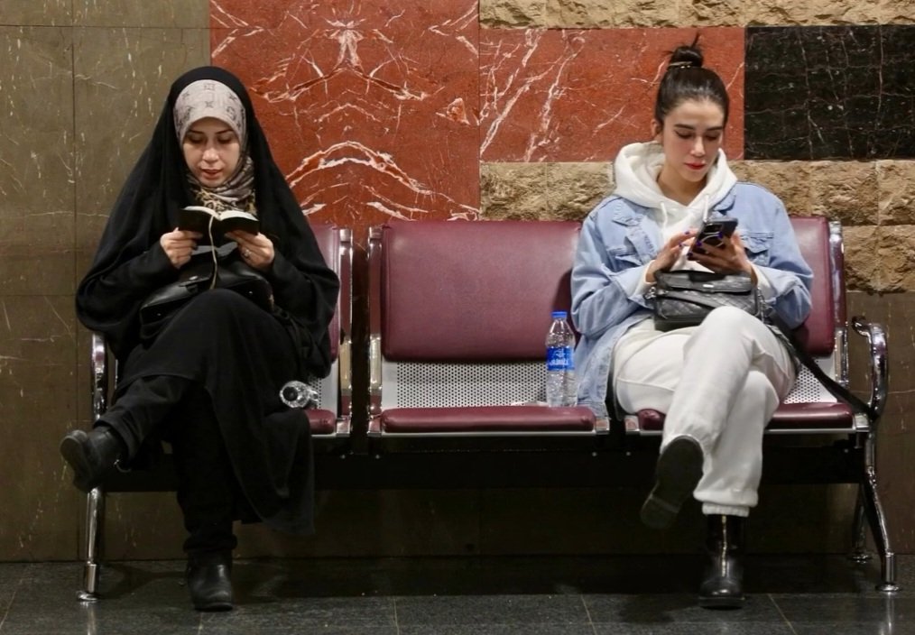 Two women at a metro station in Tehran, Iran, 2023. 

Photo by Mohamad Khodabakhsh