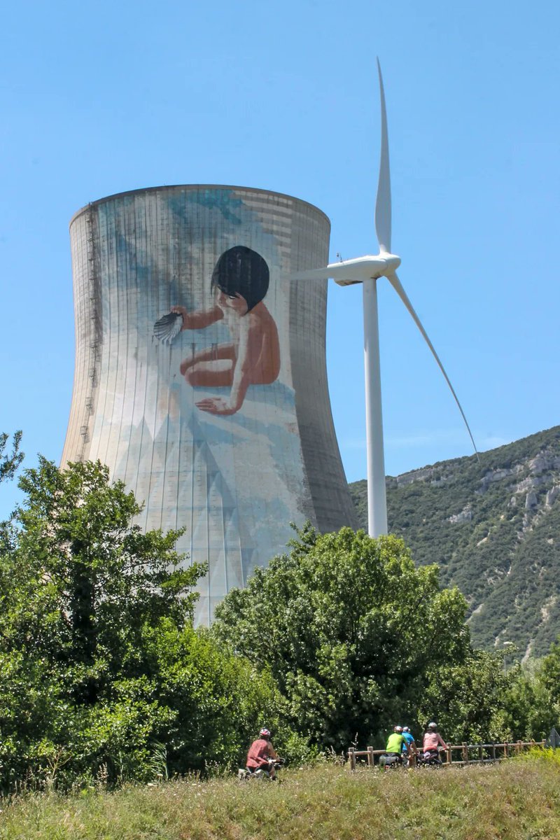 her_schneider's tweet photo. @AtomicAstrid This is a child playing  with sand of the Rhône river right bank, seen on a cooling tower of the Cruas NPP in southern France. https://t.co/idtBJDyUJ6