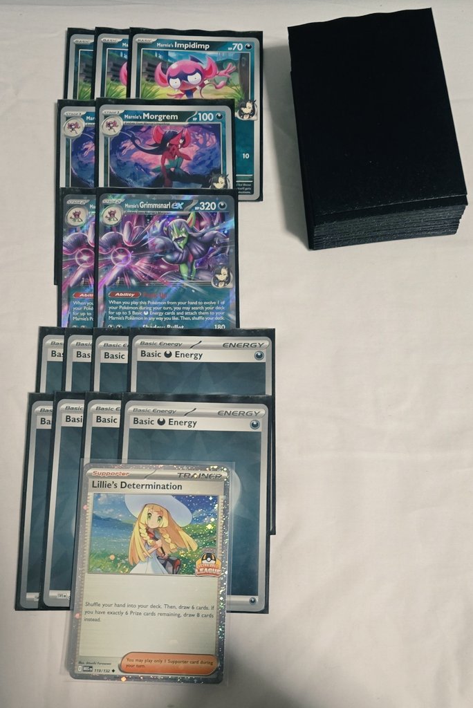 Ultra Ball League Tournament S2.1
Deck: Marnie's Grimsnarl 

R1: Roaring Moon/Gengar ⭕️ go 2nd 🎲 win
R2: Dragapult/Zard ❌️ go 1st 🎲 Lose
R3: Gardevoir ⭕️T go 2nd 🎲 Win
R4: Dragapult ❌️T go 2nd 🎲 Win

2-2. Dropped. Last game misplayed, reallt rusty
All for a lillie promo