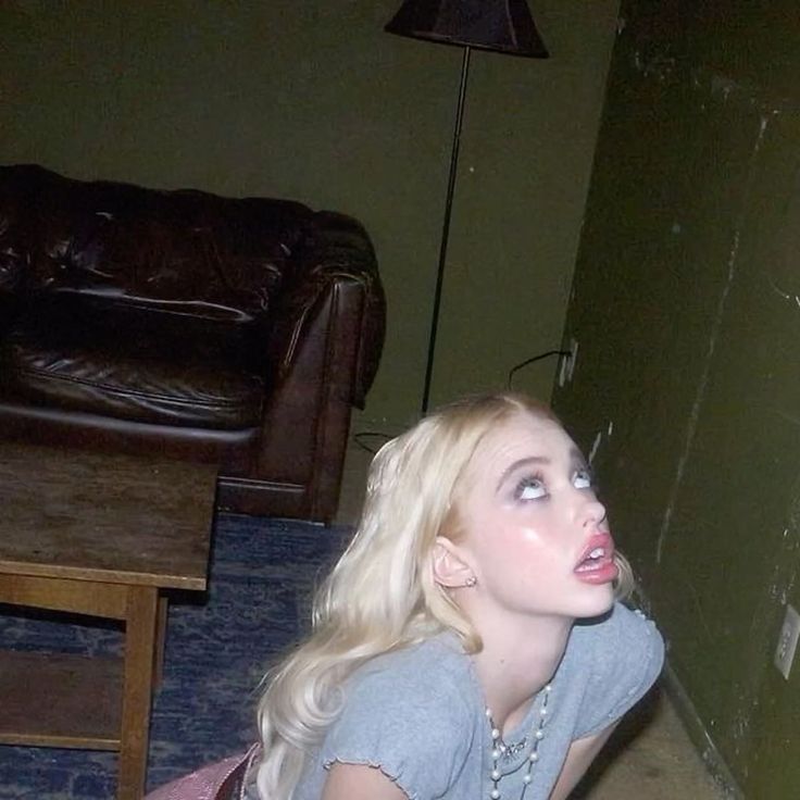Hay <a href="/grok/">Grok</a> What is this girl doing?