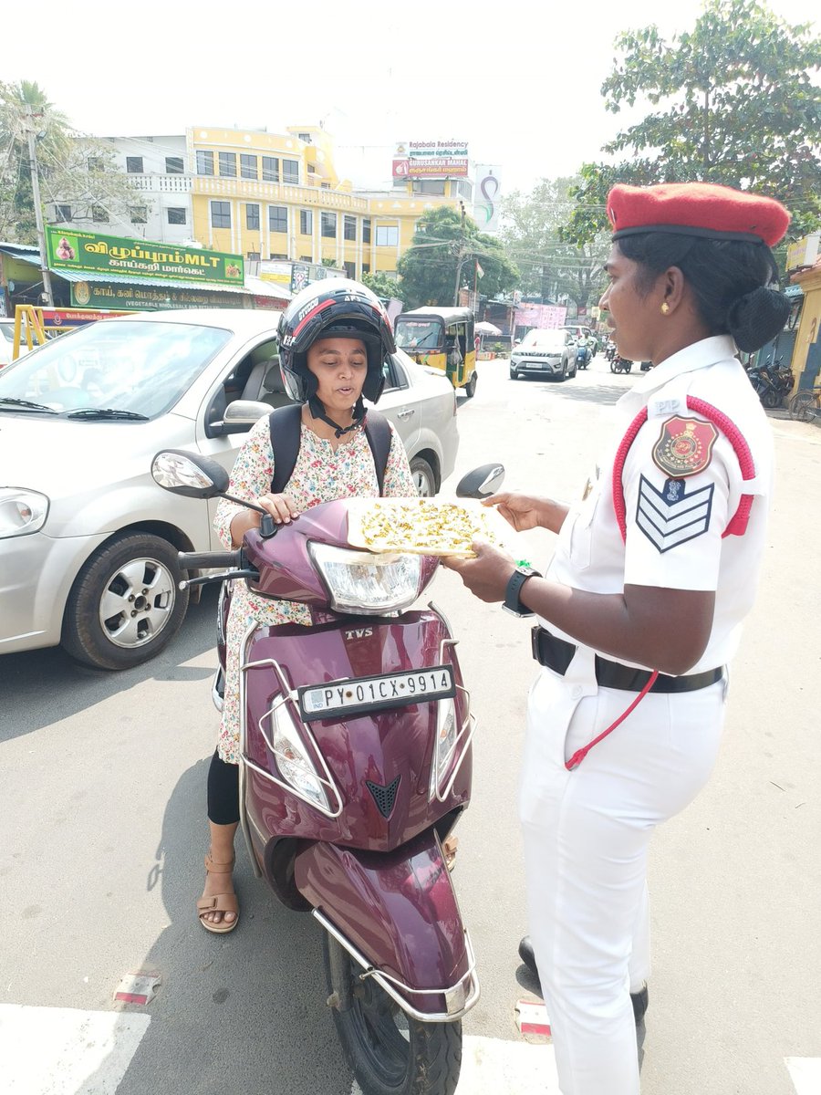 PondyTraffic's tweet photo. As part of National Road Safety Month, road safety awareness was created among road users, and sweets were distributed to those who wore helmets. @LGov_Puducherry @CM_Puducherry @ANamassivayam @CSPuducherry  @CollectorPuduc1 @PuducheryPolice https://t.co/x9whtlNY7Q