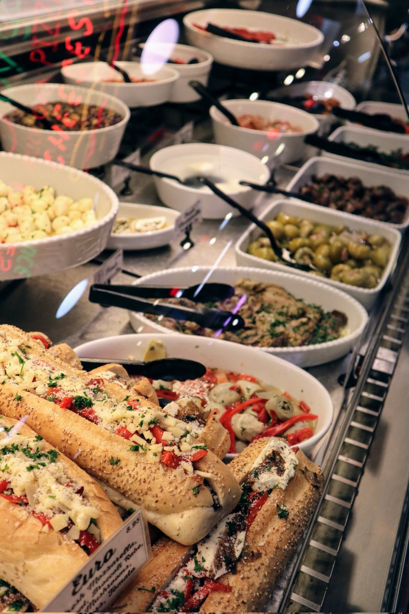 The cases filled with sandwiches, pastas, Italian specialties ready to be scooped and packed and on their way to your table.