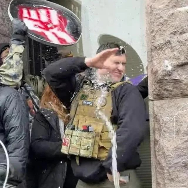 Neo-Nazi Jake Lang getting hosed by protesters in Minneapolis