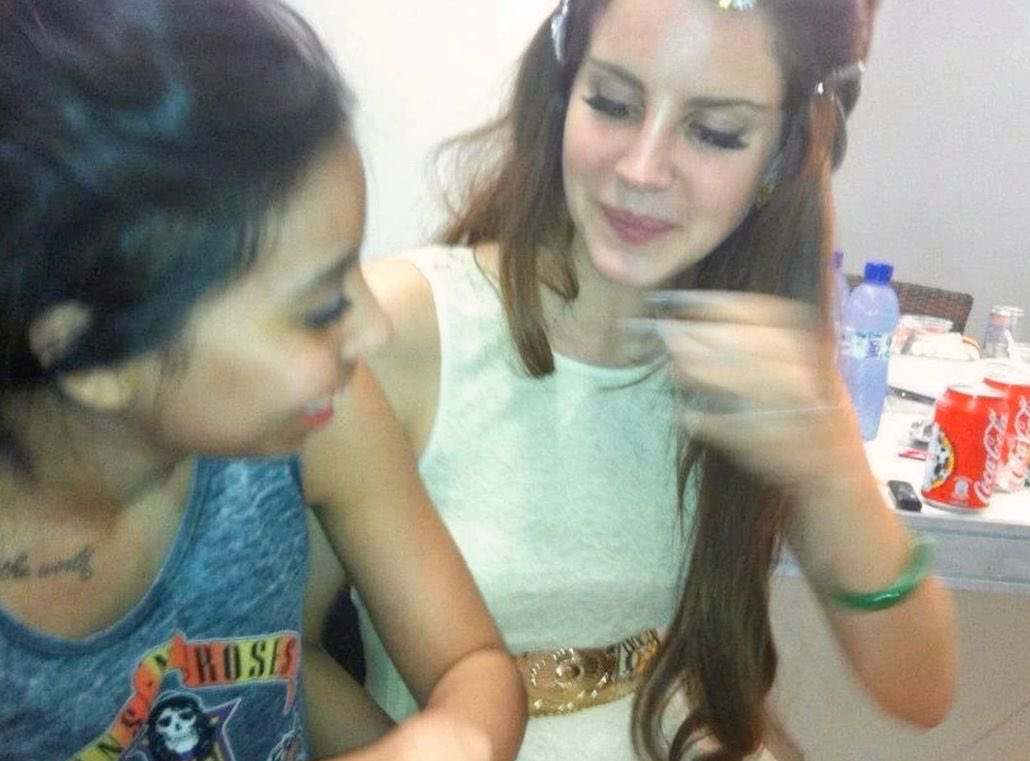 lindsayslung's tweet image. lana de rey smoking a blunt with a fan backstage, 2012