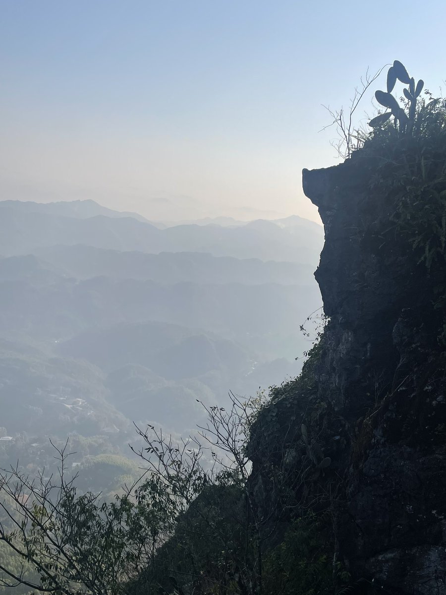 Pic1: view of the mountains from my apartment complex 
Pic2: kid at Farmer’s Market selling goldfish for about 14¢ each
Pic3: up top on one of the mountains looking down into the valley. Haze is from farmers burning dried previous crops
Pic4: same valley but notice the cactus!