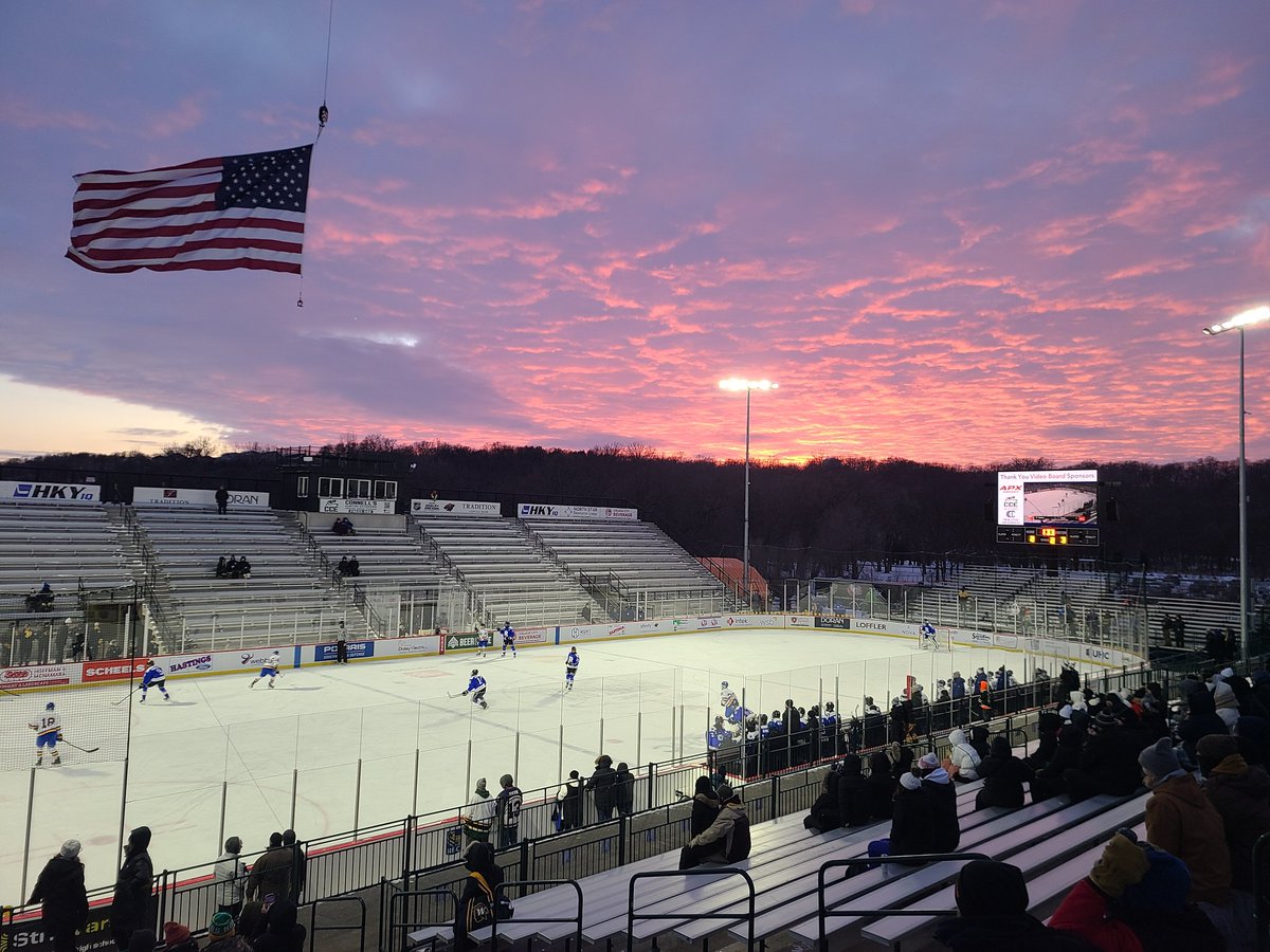 Sun setting over Hockey Day Minnesota rink In Hastings during the Rogers vs Wayzata game Saturday.