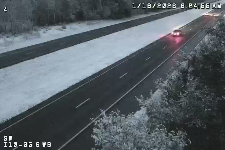 BenNollWeather's tweet image. Sunrise reveals a snow-covered landscape in the Florida Panhandle along Interstate 10.